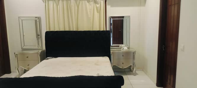king size bed with mattress elegant side table and dressing table