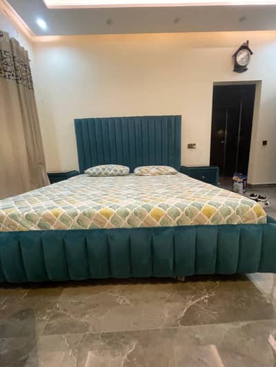 King sized  bed with side tables slightly used