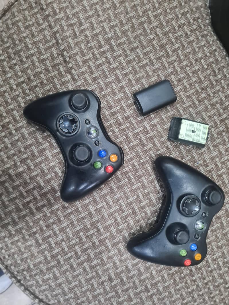 2 xbox 360 wireless controller's 0