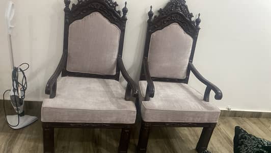 In v v gud condition with two chairs recently cushioning done