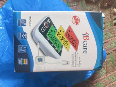 Electronic BP monitor (Blood pressure machine)