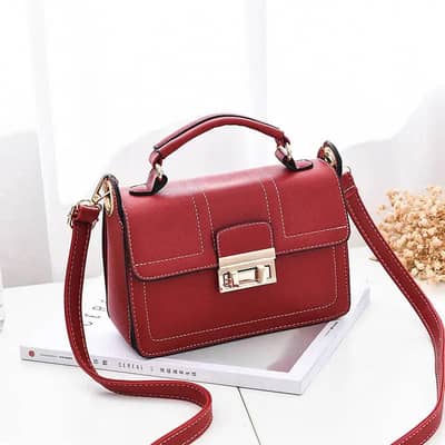 Women's black Cross body bag with gold hardware