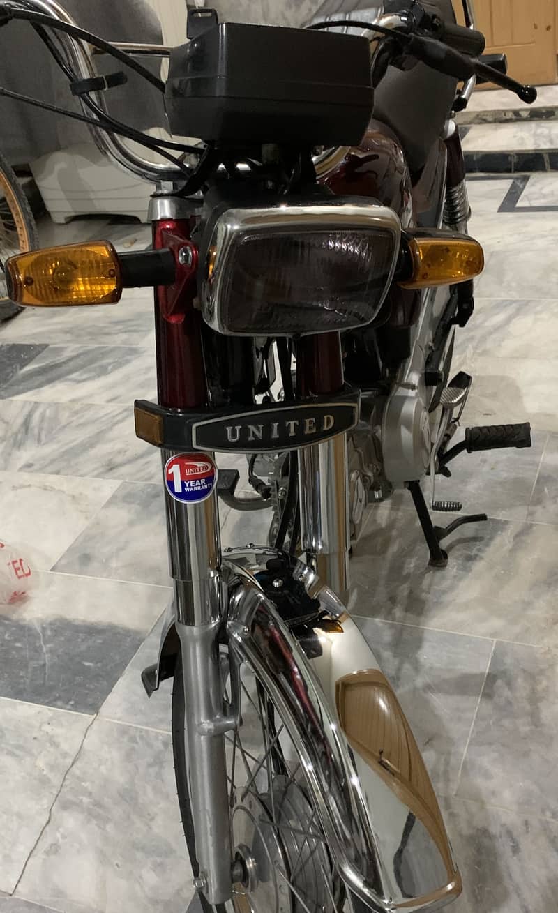 United 70cc 5