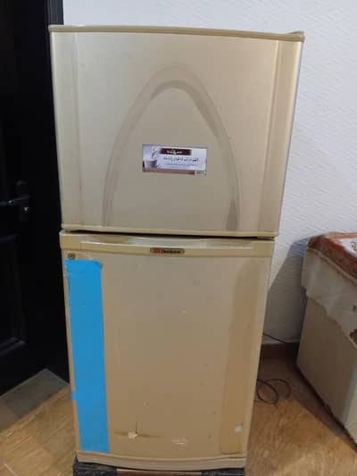Dawlance gold colour fridge