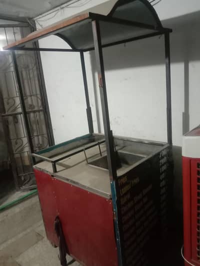 fires counter with  stove burner and deep fryer
