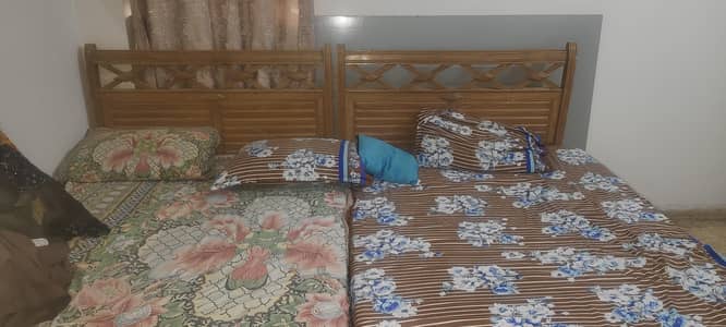 2 Single Wooden Beds in Good Condition.
