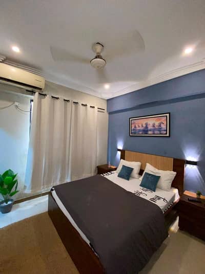 Daily Basis Apartment & Rooms Per day Perweek Short stay Available in E-11 Islamabad