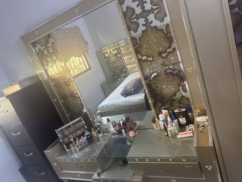 Bed with side table, dressing table and cupboardd 3