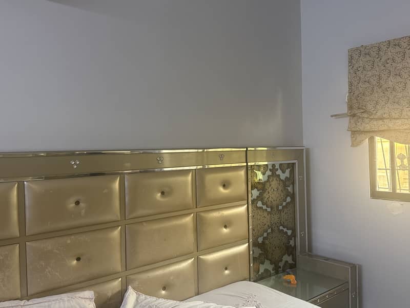Bed with side table, dressing table and cupboardd 4