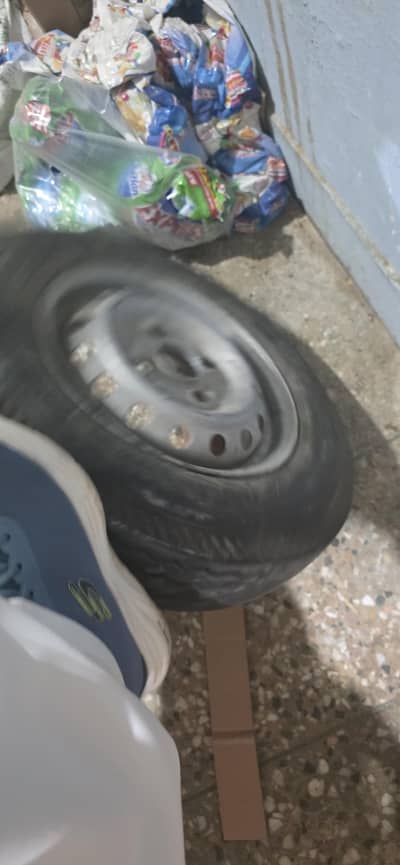 one tyre for suzuki bolan /pickup with rim