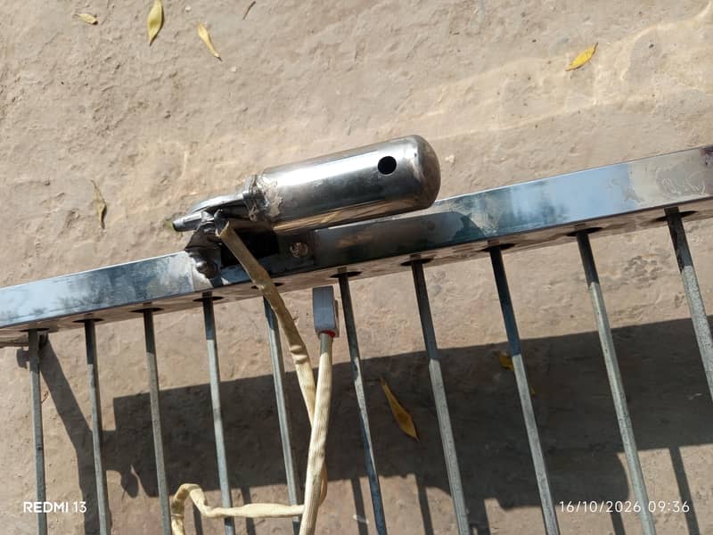 تصویر ایک خودکار گرلنگ یا باربی کیو (BBQ) مشین کا 4