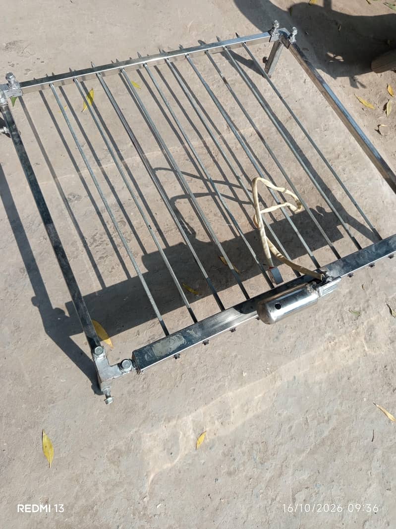 تصویر ایک خودکار گرلنگ یا باربی کیو (BBQ) مشین کا 5