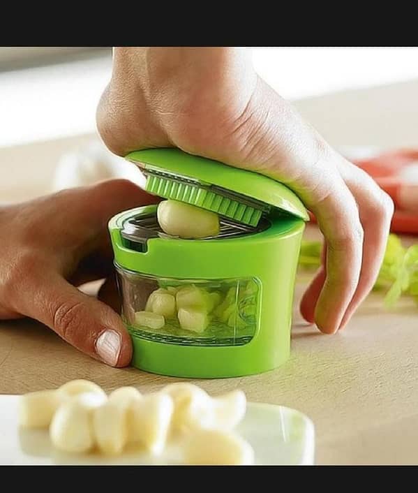 T  Mini Garlic Presser
