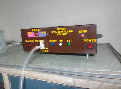 Liqiud Filling Machine, Adjustable timing Machine.
