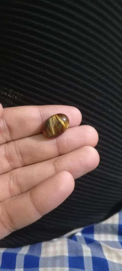 Tiger eye stone for sale  serious buyers contact me  03490760970
