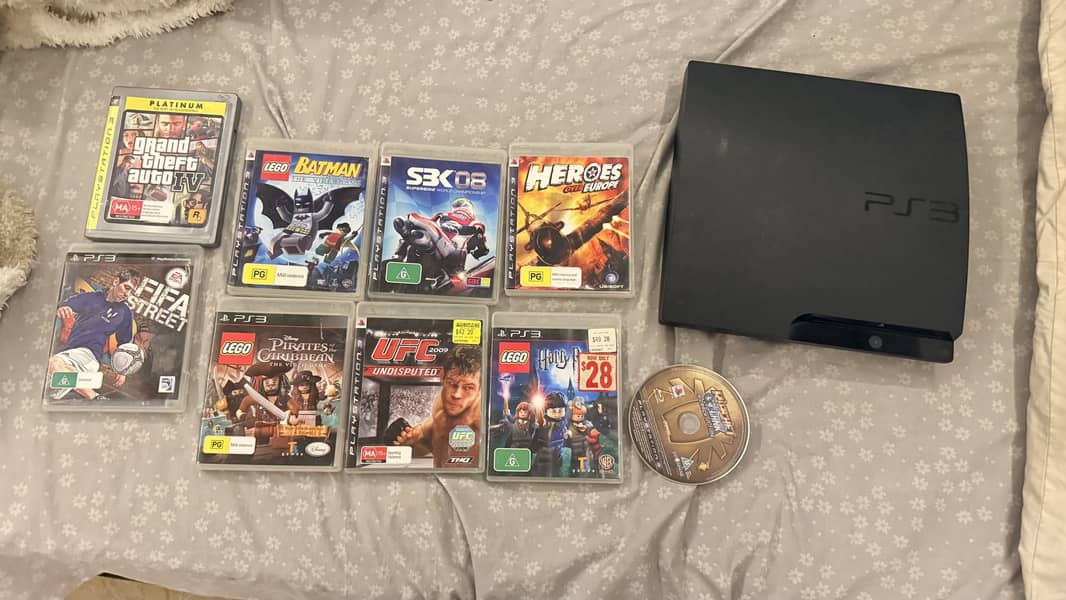 Ps3 with 9 cds and one wired controller 0