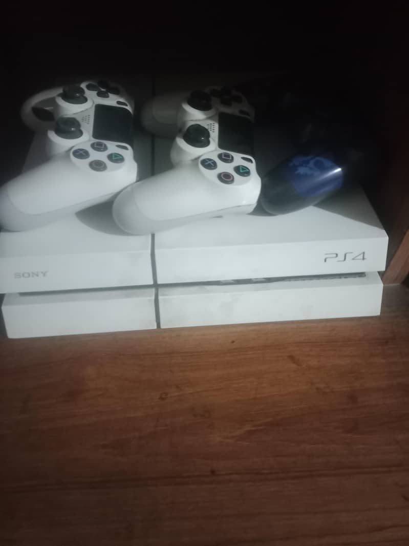 PS4 with games and 1 controller 0