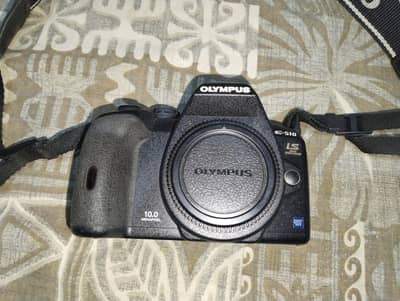 Nikon digital camera ,Olympus body