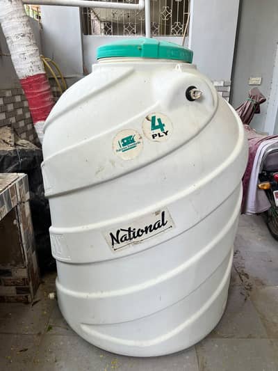 Water storage tank with a 1,000-litre capacity.