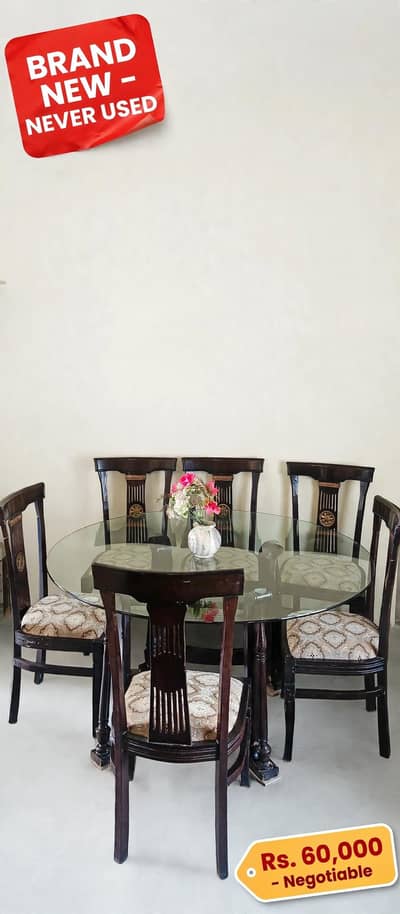 glasse dinning table and 6 chairs