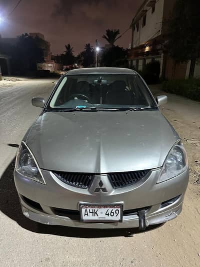 Mitsubishi Lancer Glx ,urgent sale,  fuel average of around 13 14