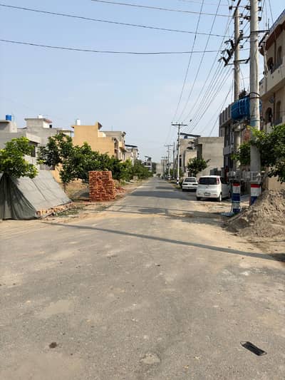 3.5 Marla Residential Plot in a Prime Location Surrounded by Houses