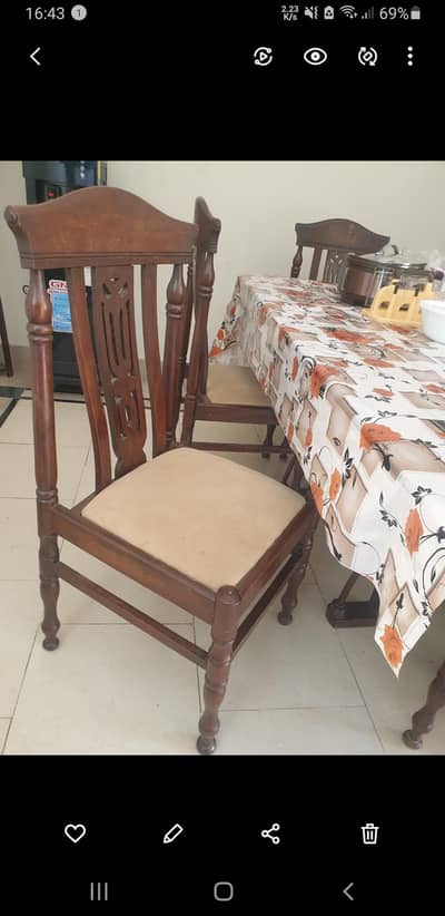 Wooden dinning table and chairs