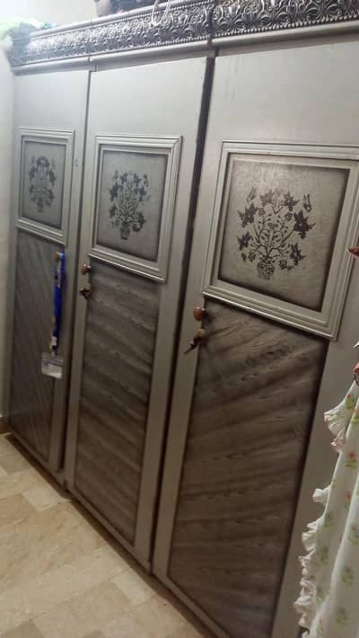 Bed, side Table, Dracing set, and Three door cabinet