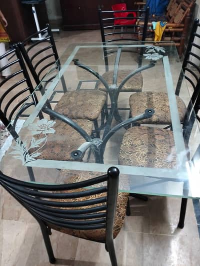 Iron 6 seater dining chair  with thic glass table