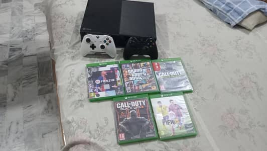 Xbox one 1tb with 2 controllers and games