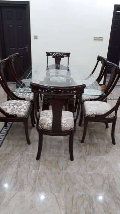 Dining table and 8 chairs good condition