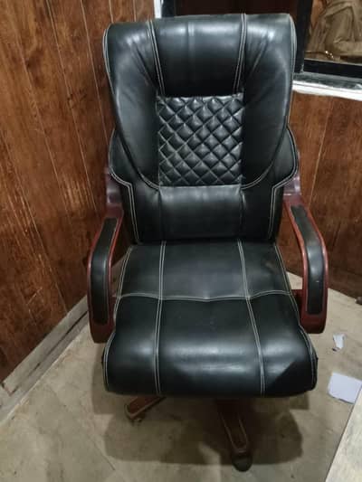 2 table and 2 boss chair