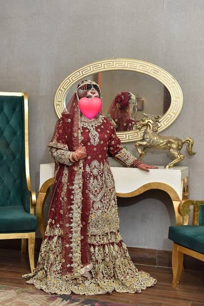luxury mehroon bridal lehenga with heavy golden embroidery brand now