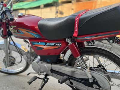 United 70 cc motorcycle 26 27