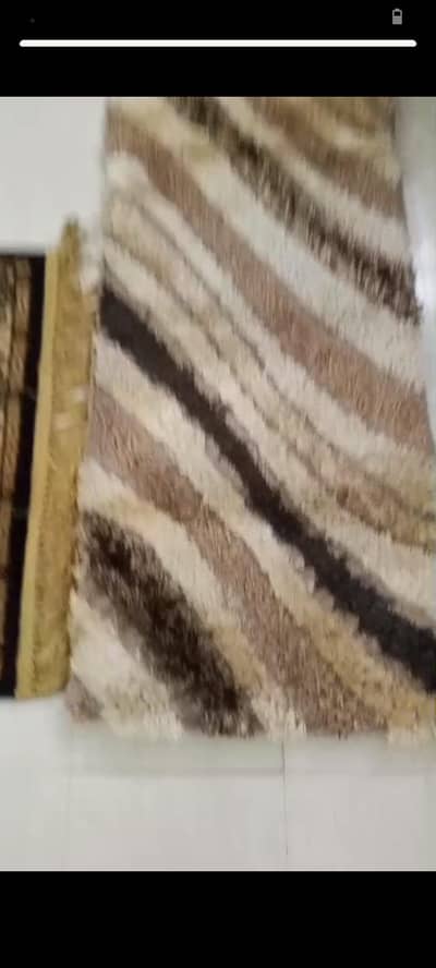 3  rugs of different sizes
