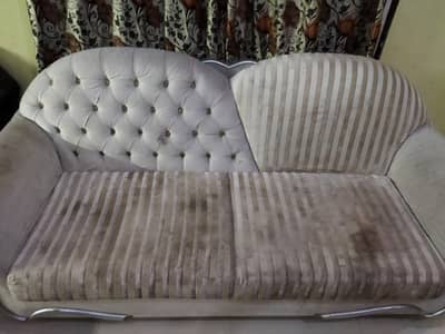 Pair of 3 seaters sofa with center table.