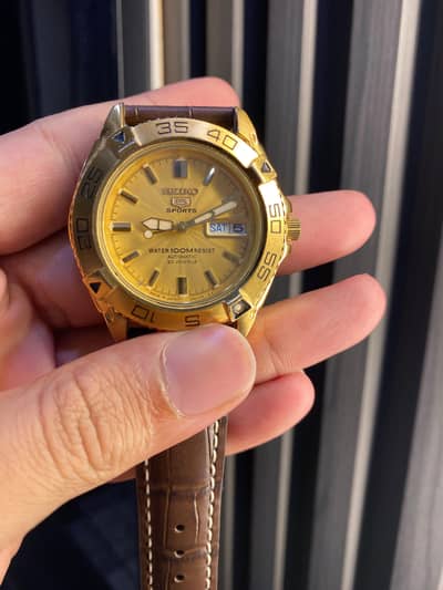 Seiko 5 Sports 100m Automatic 23 Jewels – Golden Dial