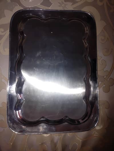 Steel tray for serving