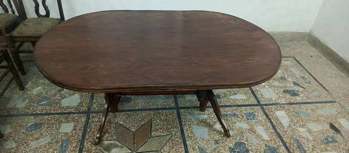 Dinning Table and 5 chairs 3 chairs are okay and 2 need repairs