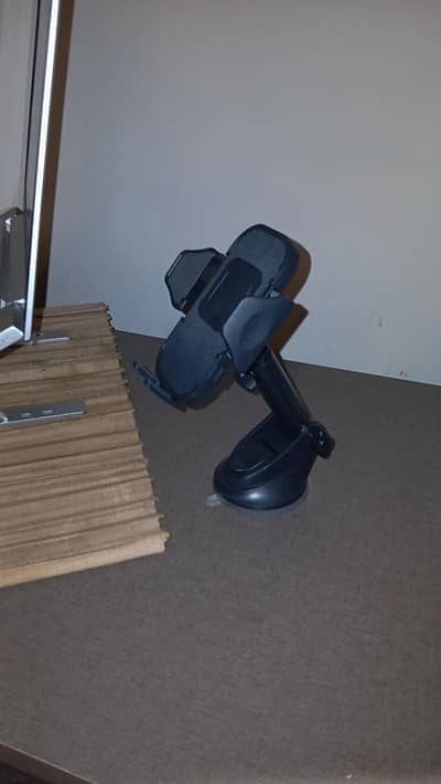 Stick on Mobile Holder