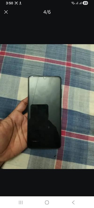 Samsung Mobile A06 , 4/128.03196643103