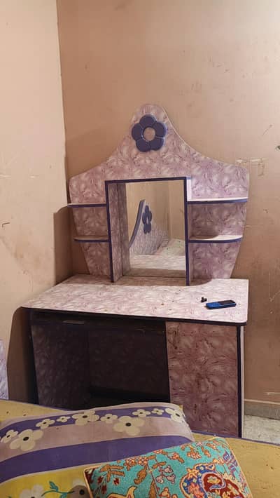 single bed with inner sliding bed and dressing table