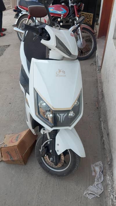 Huagan company IBX model Scooty
