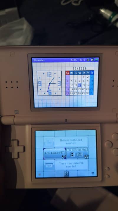 Nintendo Ds light pink with charger stylus game