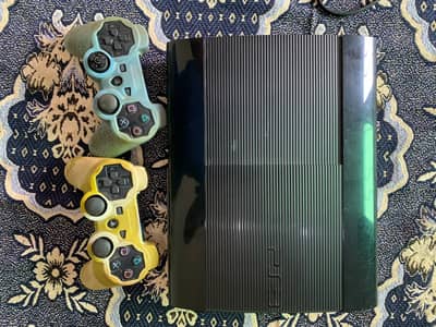 Sony PS3 Super Slim with 2 Controllers – Good Condition