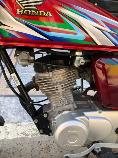 Honda 125 total genuine red colour 2023 lush condition