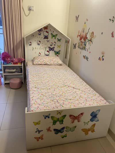 Wooden single bed