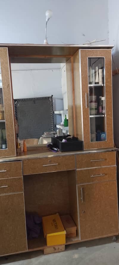 beauty salon chair and cupboard