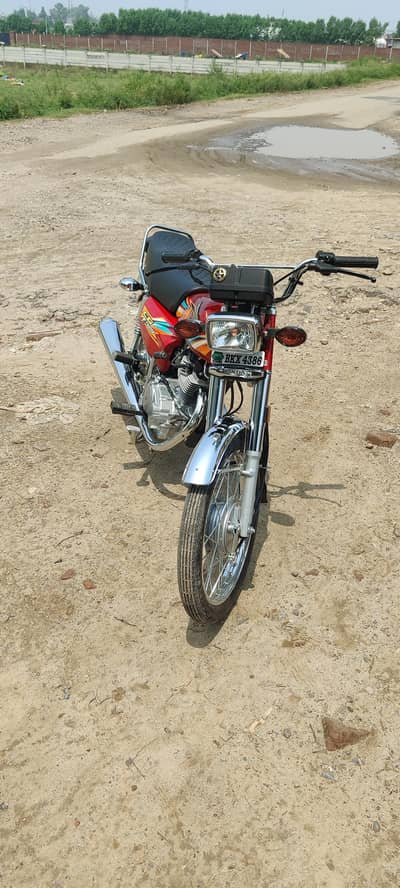 Honda 125 red colour urgent for sale