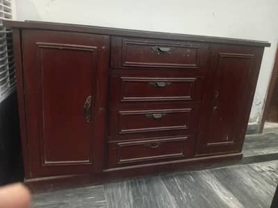 Double bed with mattress and dressing table.
